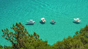 Europe, Italy, Sardinia. View of the boats in Cala Luna