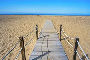 Walkway Prints: Europe, Italy, Sardinia. A wooden gangway to the long sandy beach of Piscinas