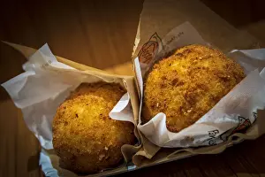 Tradtional Prints: europe, Italy, Sicily. Arancini - traditional sicilian street food made of rice and other ingredients