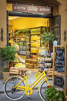Images Dated 20th June 2022: Europe, Italy, Sicily. Palermo. A food store selling limoncello