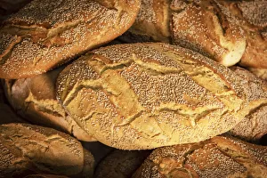 Bakery Prints: Europe, Italy, Sicily. Sant Angelo Muxaro. White bread loaves in the traditional bakery