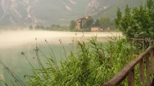 Autonomous Region Prints: Europe, Italy, Trentino. The lake of Toblino on a foggy day with the beautiful castle