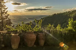 europe, Italy, Tuscany. ancient terracotta amphorae at sunset