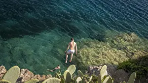 Western Prints: Europe, Italy, Tuscany, Elba Island - Cliff juming in the bay of Barbarossa