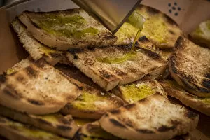 europe, italy, umbria. toasted bread with olive oil