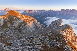 Europe, Italy, Veneto, Cadore, Auronzo. Sunrise with sea of clouds from Camosci peak, Marmarole