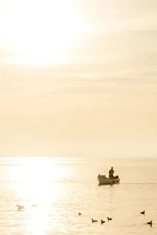 Garda Prints: europe, Italy, Veneto. a fisher man at the Garda Lake