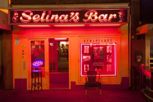 Images Dated 25th November 2013: Europe, Netherlands, Holland, Amsterdam, Red Light district, a strip bar in the red