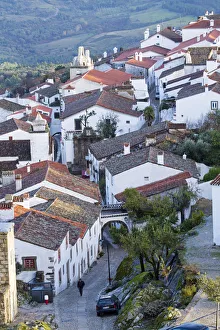 Images Dated 23rd September 2015: Europe, Portugal, Alentejo, Portalegre, Marvao village - a man walking along a cobbled