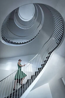Europe, Switzerland, St.Gallen, woman on a staircase MR