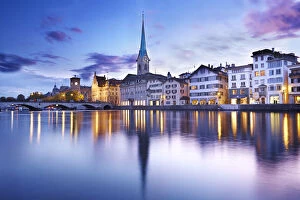 Downtown Collection: Europe, Switzerland, Zurich, a night time view of the clocktower of Fraumunster cathedral