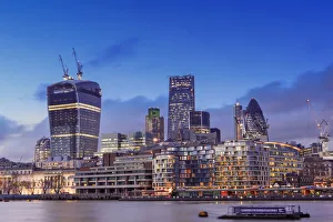 Europe, United Kingdom, England, London, City of London, skyline at dusk showing