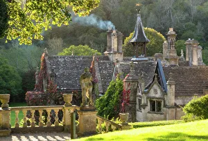 Evening light on The Manor House, 14th century building set in 365 acres of secluded parkland in the Cotswold village Castle Combe, Wiltshire, Cotswolds, England