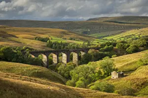 October Prints: Evening sunlight illuminates Dent Head Viaduct in the Yorkshire Dales National Park