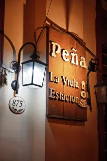 Cordillera Prints: Detail over the exterior facade of the 'Pena La Vieja Estacion' folkloric restaurant