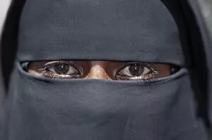 The eyes of a Lamu woman wearing a traditional black