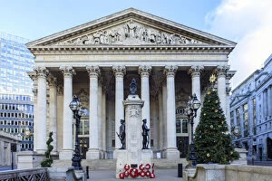 Facade of the Royal Exchange at Christmas time with a Christmas tree, City of London