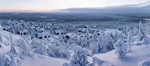 Chalet Prints: Fairy tale arctic village of Pudasjarvi with snowy cottages in the winter scenery of Finnish Lapland