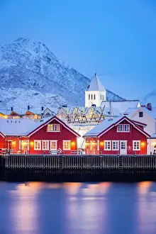 Lofoten Prints: Fairy tale fishing village of Svolvaer covered with snow at winter dusk