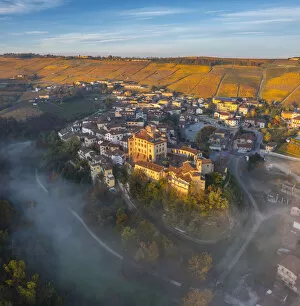 Roof Collection: Falletti Castle and Barolo at sunrise during autumn, Cuneo, Langhe e Roero, Piedmont