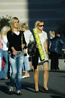 Images Dated 15th September 2006: Fashionable Young Girls Walking down Street