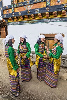 Images Dated 27th May 2020: Female performers talking at a local festival in Paro District, Bhutan