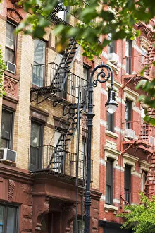 Fire Escapes and building exterior in the west village, New York, USA Fire Escapes and building exterior in the west village, New York, USA