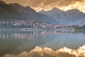 Fire sunrise on Lecco mountains, lake Annone, Lecco province, Brianza, Lombardy, Italy