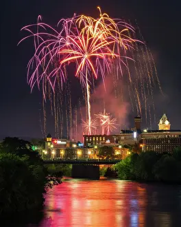 Fireworks Prints: Fireworks celebration over Merrimack River, Manchester, New Hampshire, USA
