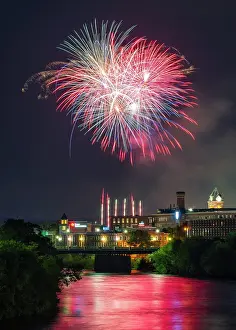 Fireworks Prints: Fireworks celebration over Merrimack River, Manchester, New Hampshire, USA
