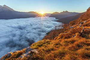Above The Clouds Prints: First light on lake Como (ramo di Lecco) covered by the fog