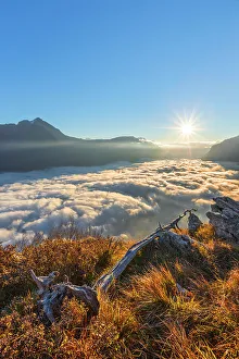 First light on lake Como (ramo di Lecco) covered by the fog, Barni, Como province, Lombardy, Italy