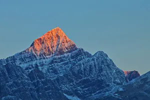 Images Dated 3rd May 2023: First light on a peak of the Canadina Rocky Mountains, Icefields Parkway, Jasper National Park