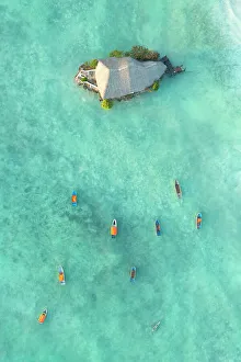 Unguja South Region Prints: Fisherman boat's near to The Rock, Pingwe, Zanzibar, Tanzania