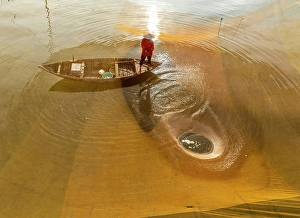Hoi An Prints: Fisherman checking his net at sunrise