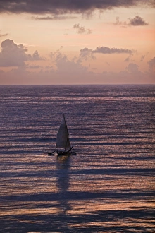 Msambweni Prints: A fisherman sets out from Msambweni, south of Mombasa, in a beautiful dawn sky