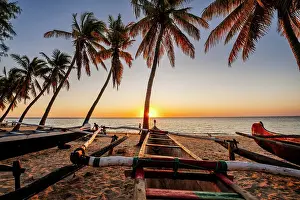 Madagascar Prints: Fishermen prepare boats at sunset. Madagascar, Africa