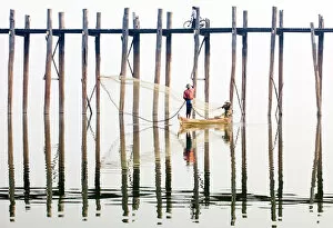 Mandalay Collection: Fishermen next to the U Bein Bridge, a 1