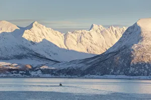 Fishing boat in Fjord, Kvaloya, Troms region, Norway