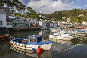 Fishing boat moored in Polperro Harbour on a sunny Spring morning, Cornwall, England