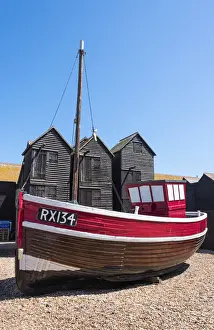A fishing boat and the net shops - a weather-proof storage for the fishing gear
