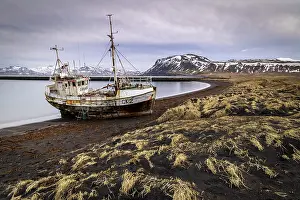 Icelandic Prints: Fishing boat stranded on black sand beach near Rif, Snaefellsnes Peninsula, Iceland