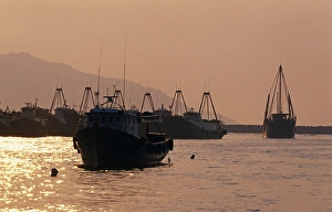 Warm Prints: Fishing boats in the harbour of Cheung Chau at sunset