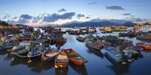 Fishing boats in harbour at dusk, Cheung Chau, Hong Kong