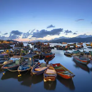 Fishing boats in harbour at dusk, Cheung Chau, Hong Kong
