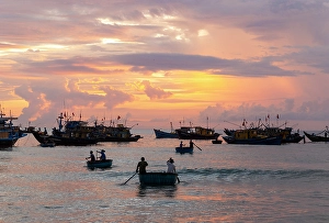 Hoi An Prints: Fishing boats offshore at sunrise, Binh Minh fish market, near Hoi An, Vietnam