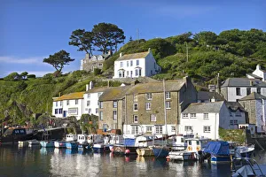 Fishing boats in Polperro Harbour, Polperro, Cornwall, England. Summer
