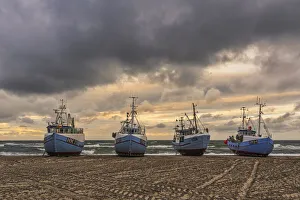 Food Gallery: Fishing boats pulled ashore awaiting the storm in the small fishing village of