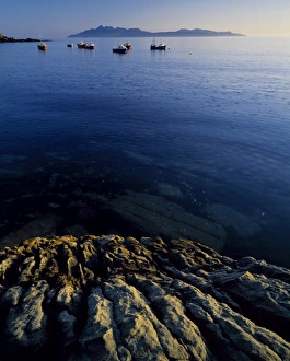 Scot Land Prints: Fishing boats rest at anchor on a still evening