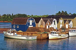 Sheds Prints: Fishing boats and sheds in coastal village New London, Prince Edward Island, Canada